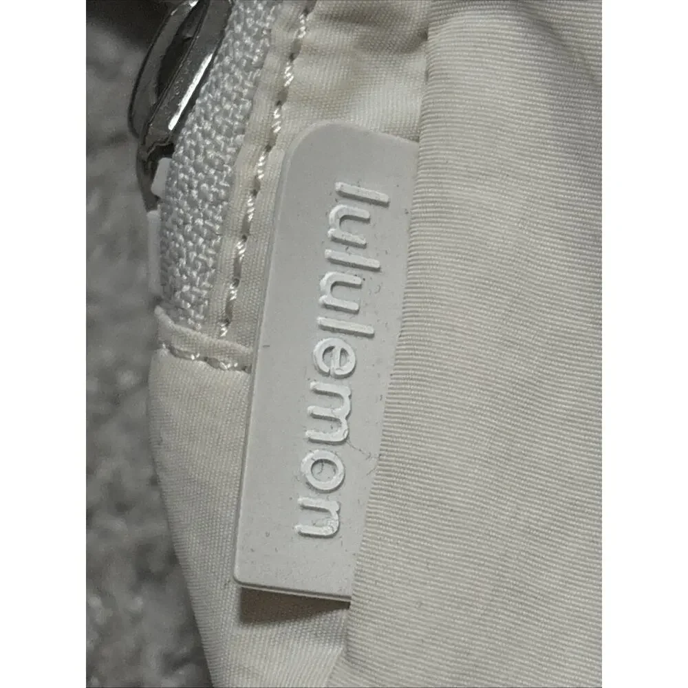 LLululemon Everywhere Belt Bag OS Adjustable Strap Ivory Metallic Logo NWOT